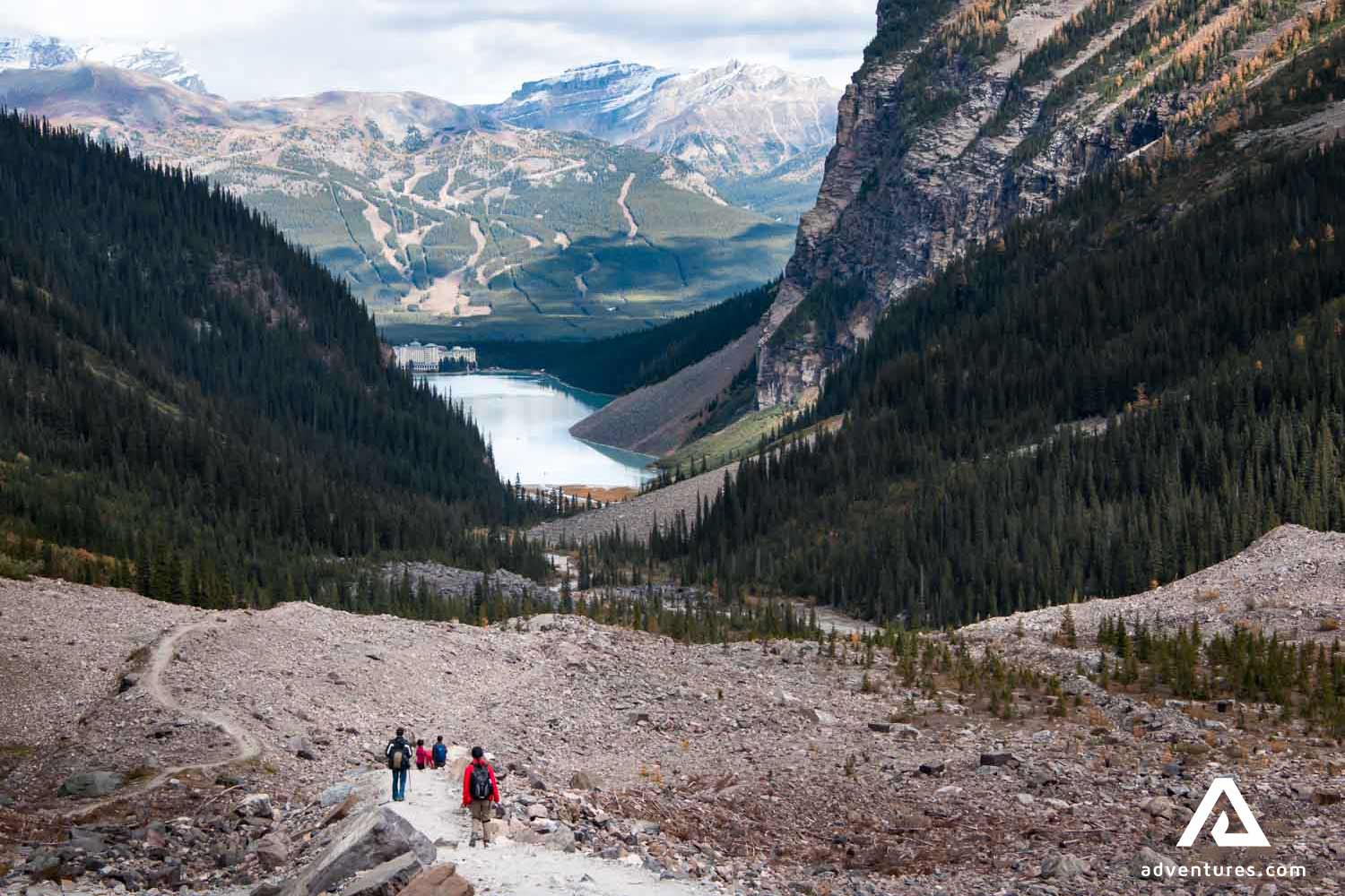 people Hiking Plain Of Six Glaciers in banff