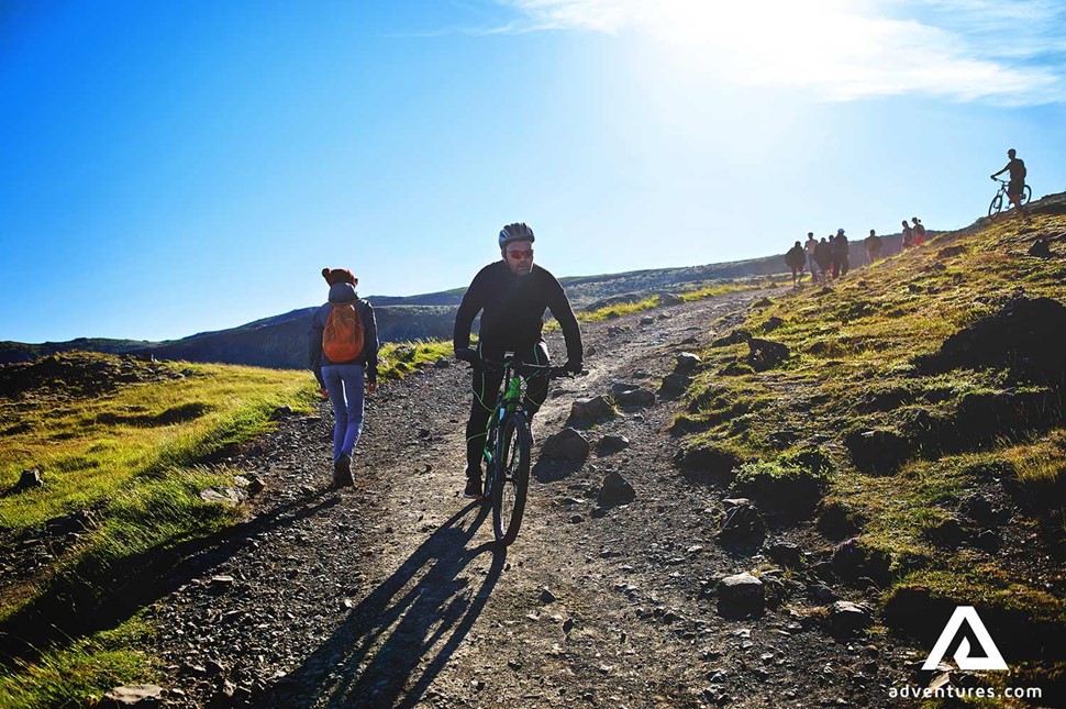 riding bicycle down a mountain near hveragerdi