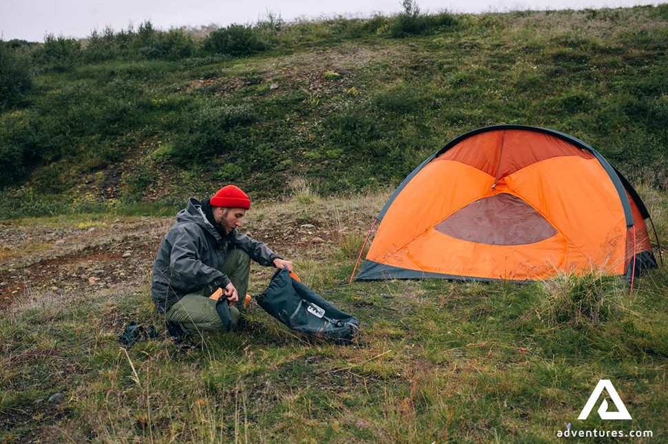 packing up camping gear in iceland