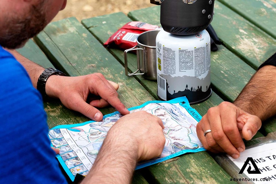 looking at landmannalaugar area map in iceland