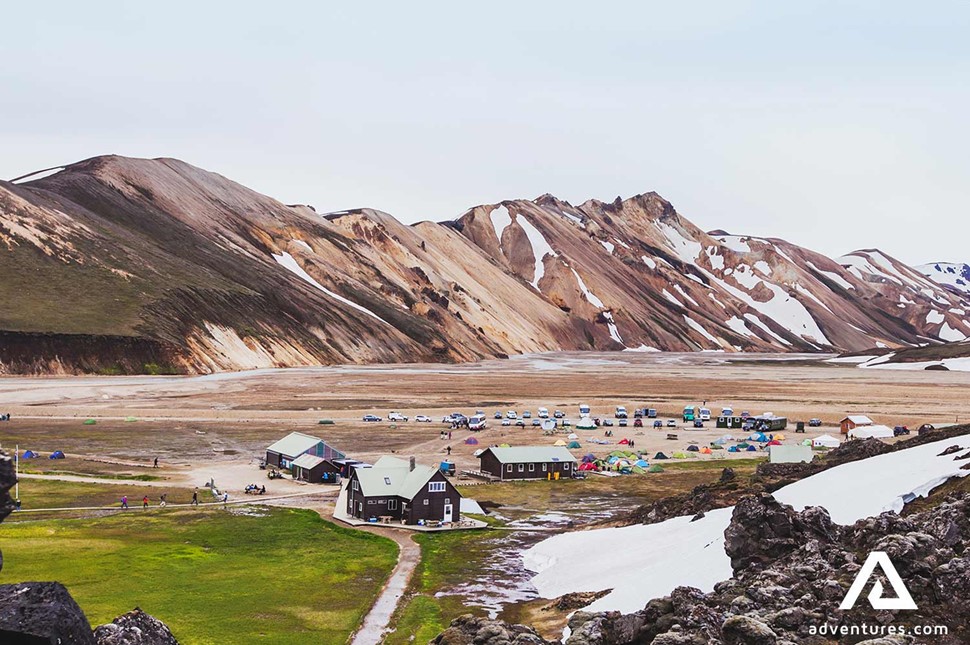 tents and houses in landmannalaugar in iceland