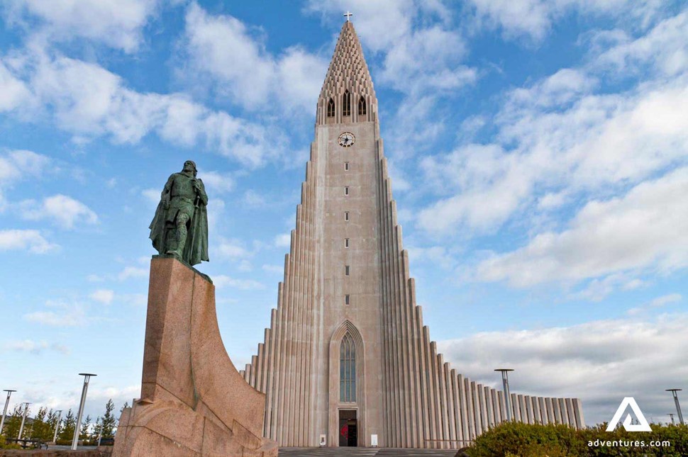 statue and hallgrimskirkja church in reykjavik