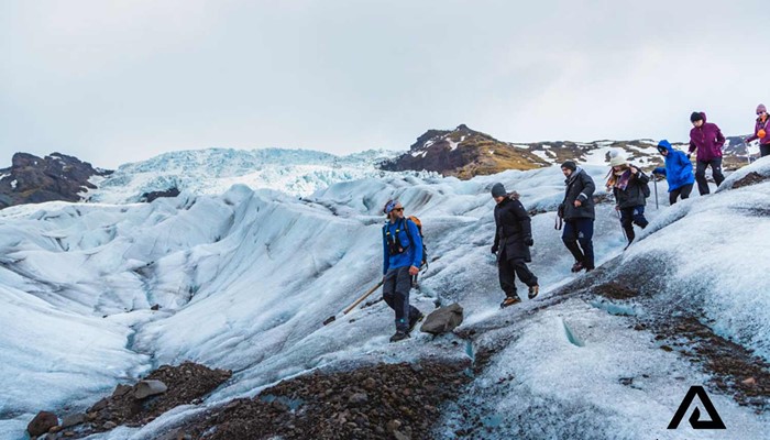 Small group walking down Falljokull glacier