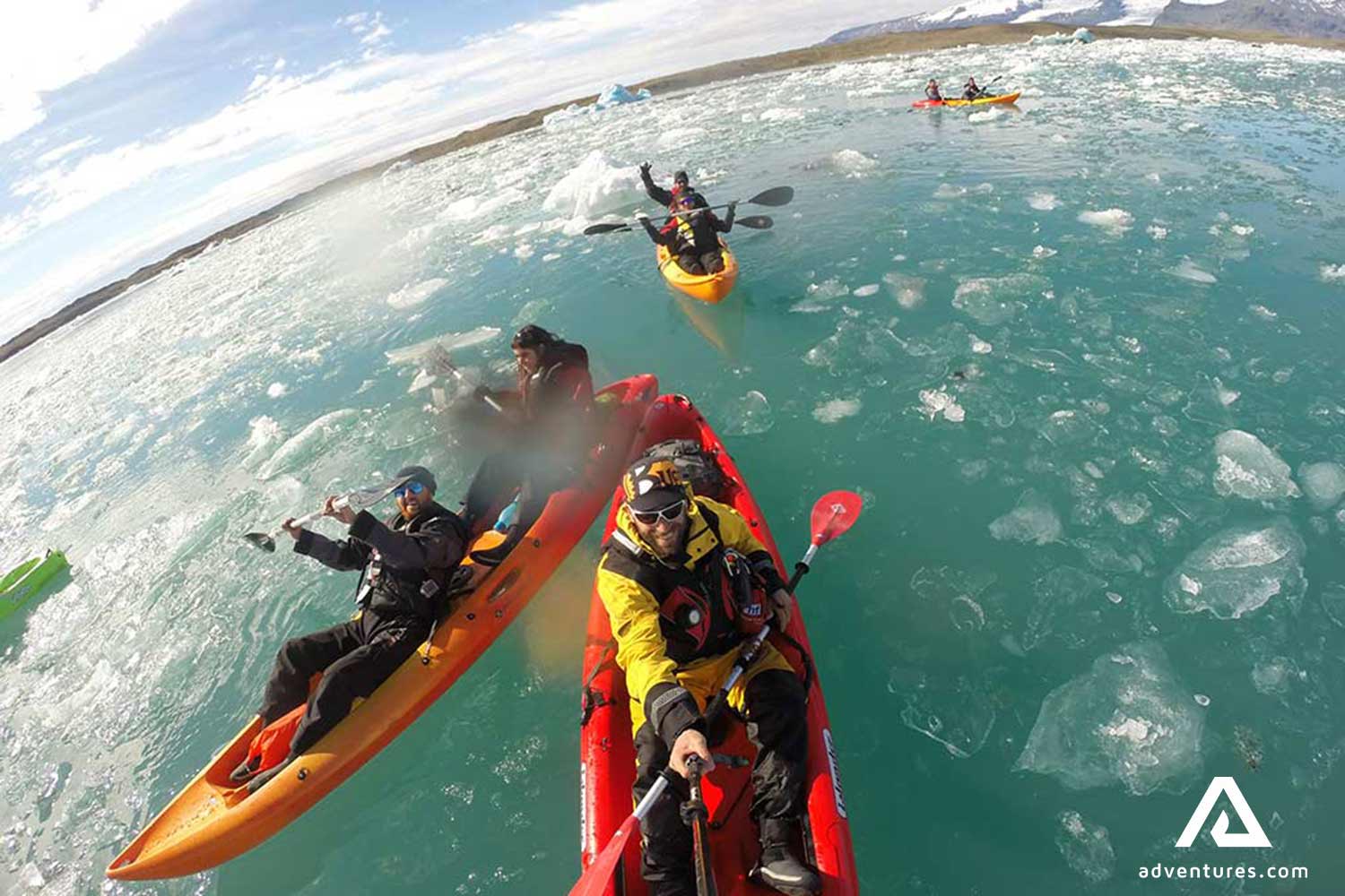 Happy group selfie in the Jokulsarlon glacier lagoon