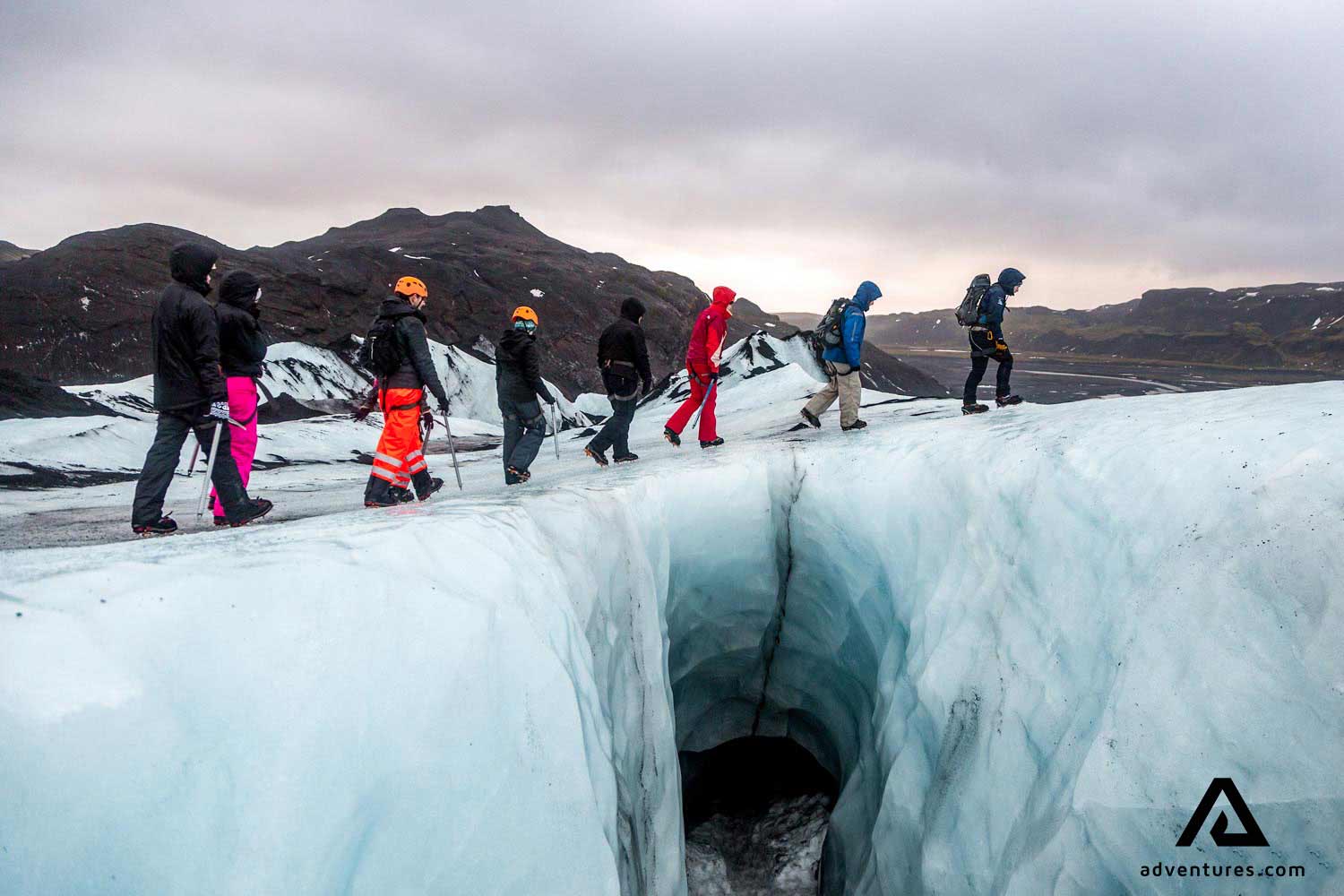 walking near a crevasse on solheimajokull