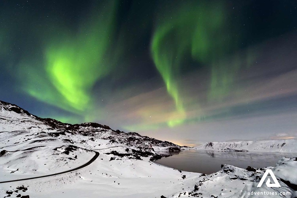 northern light above a winter landscape in iceland