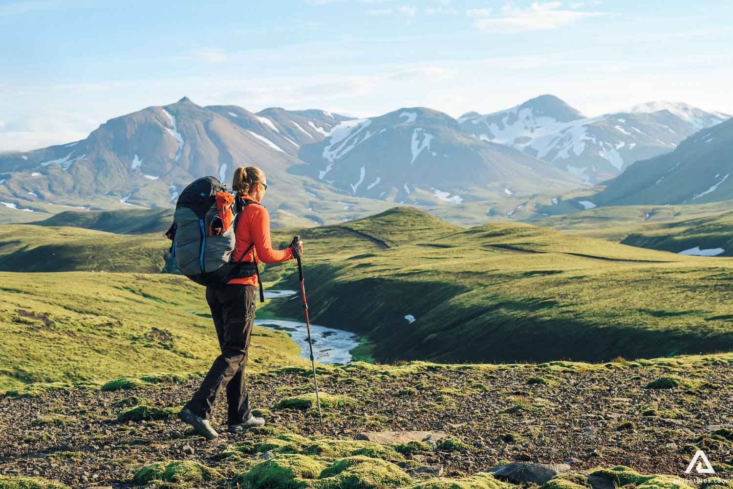 Woman trekking laugavegur trail in Iceland