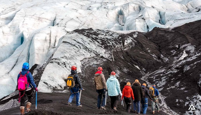 walking on the solheimajokull glacier in iceland