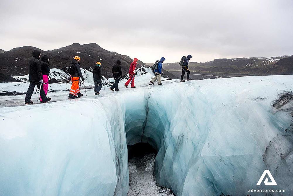 walking on a glacier in line