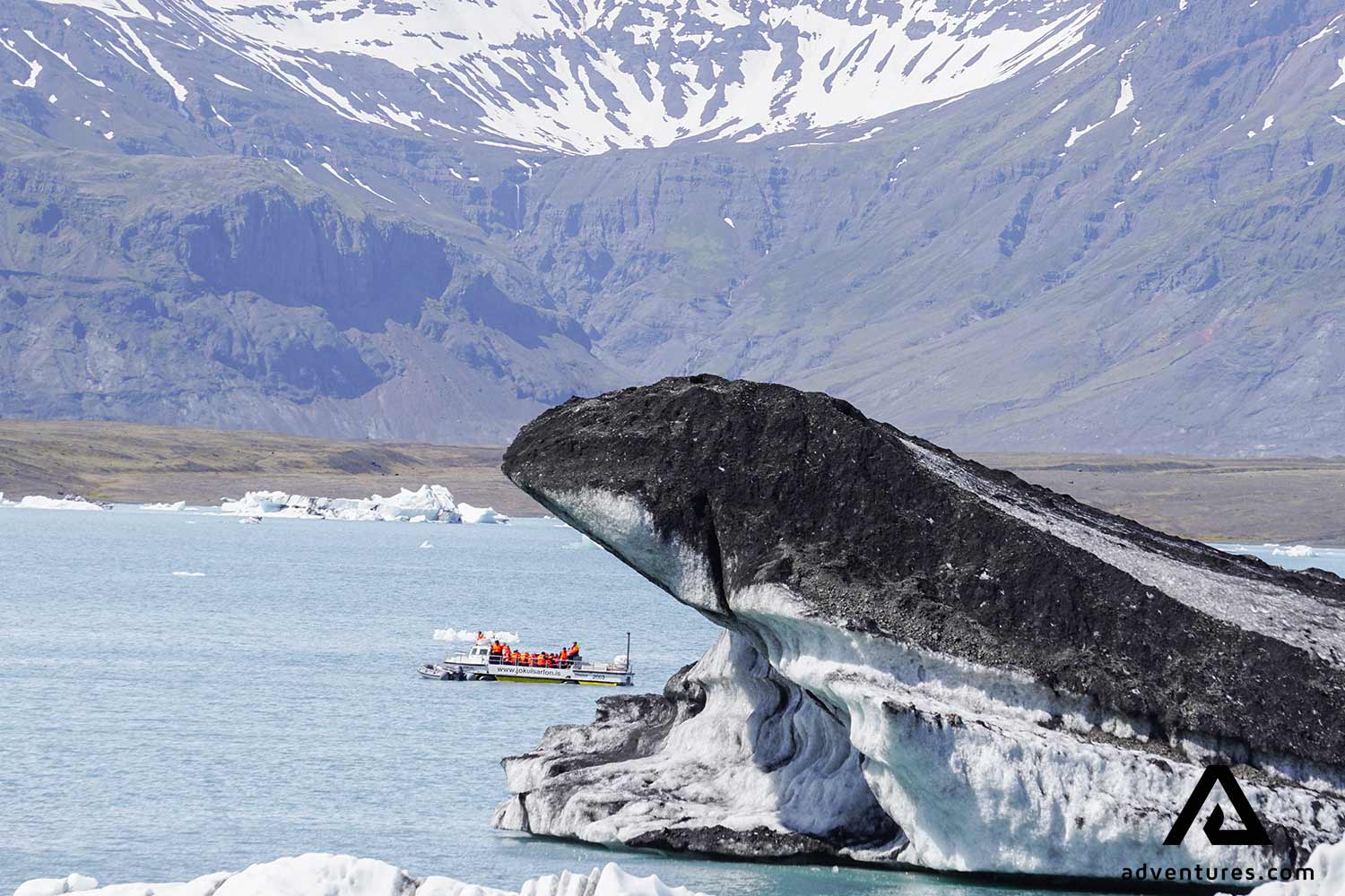 big iceberg floating in Jokulsarlon
