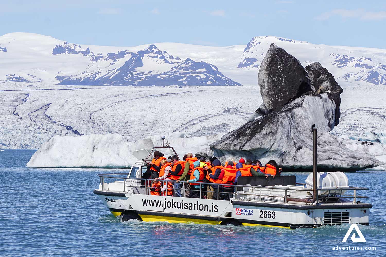 group of people in an amphibian boat on a tour