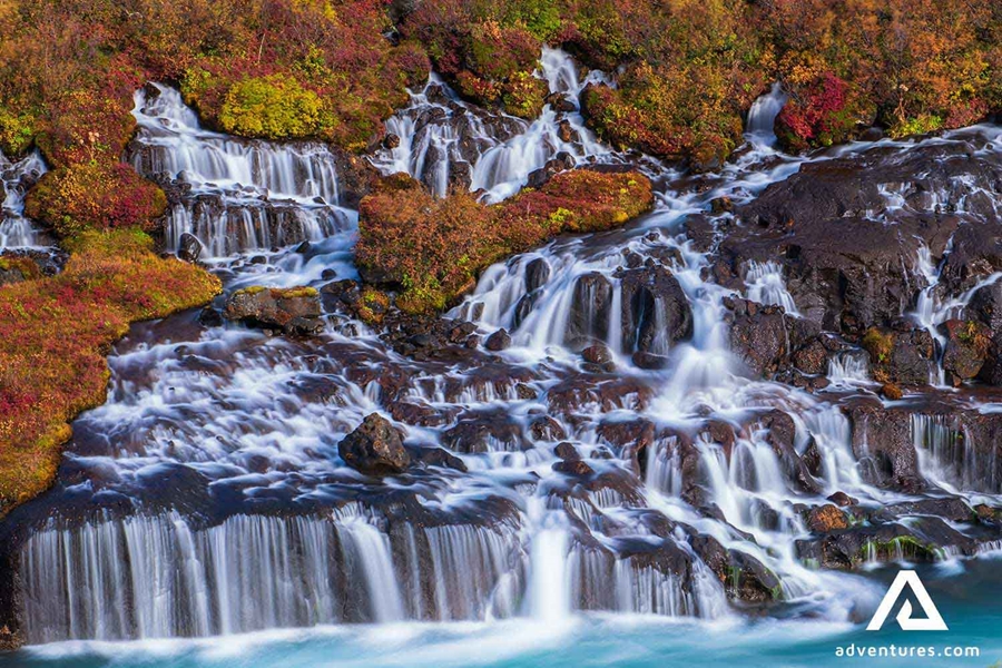 hraunfossar waterfall in autumn