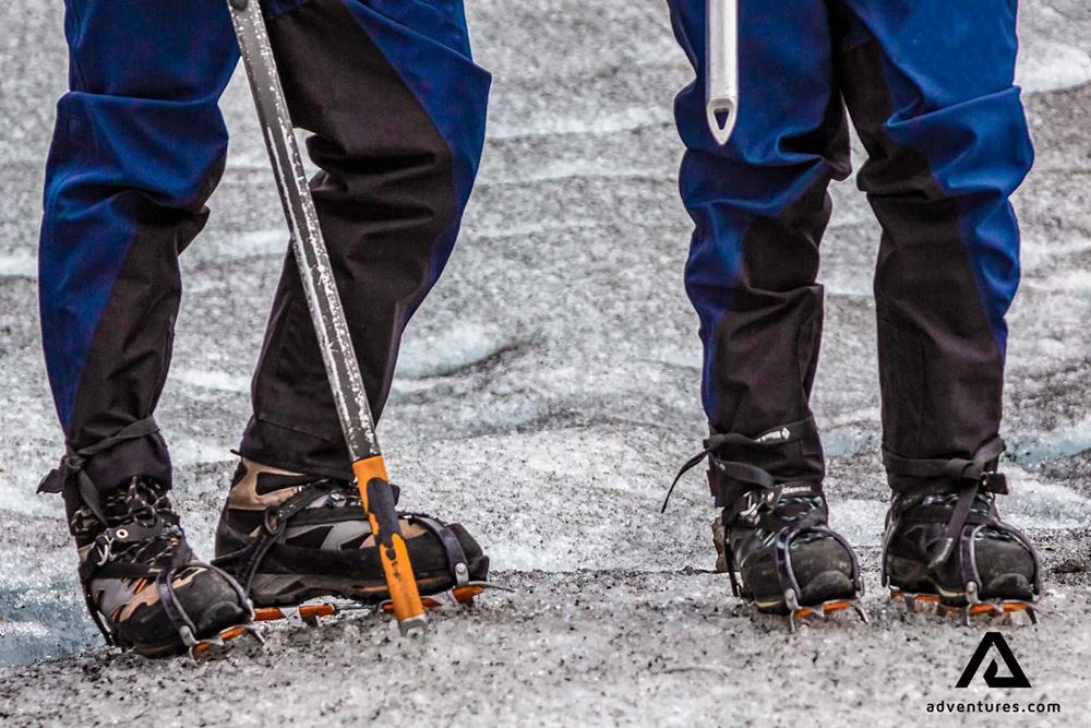 crampons and ice axe on two people