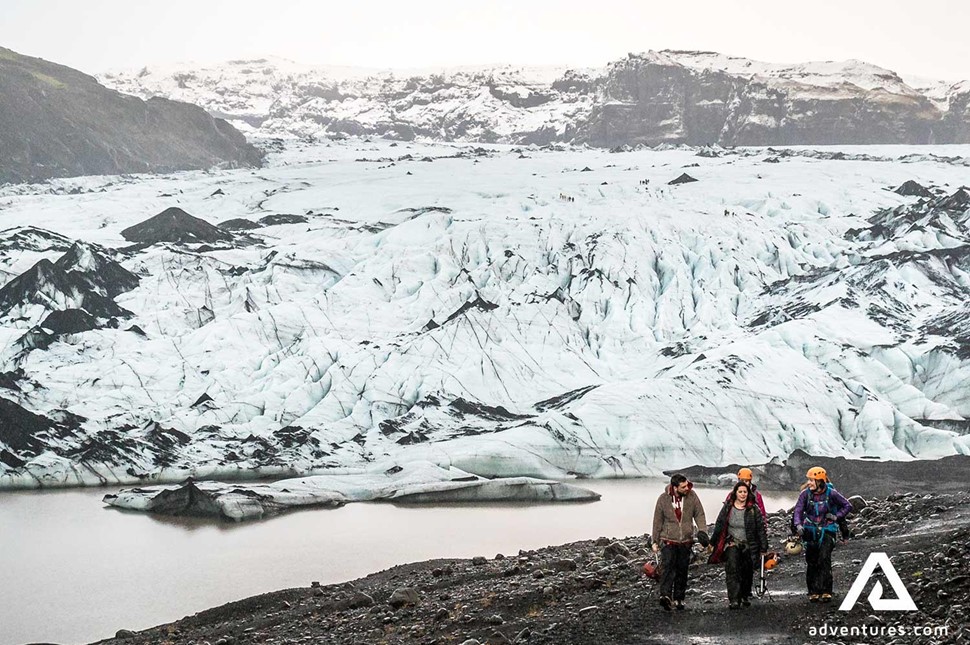 People walking near Solheimajokull glacier