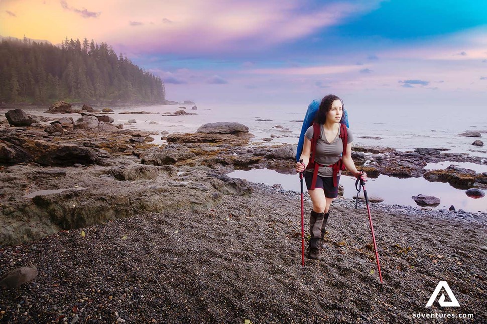 woman backpacking in a beach in british columbia