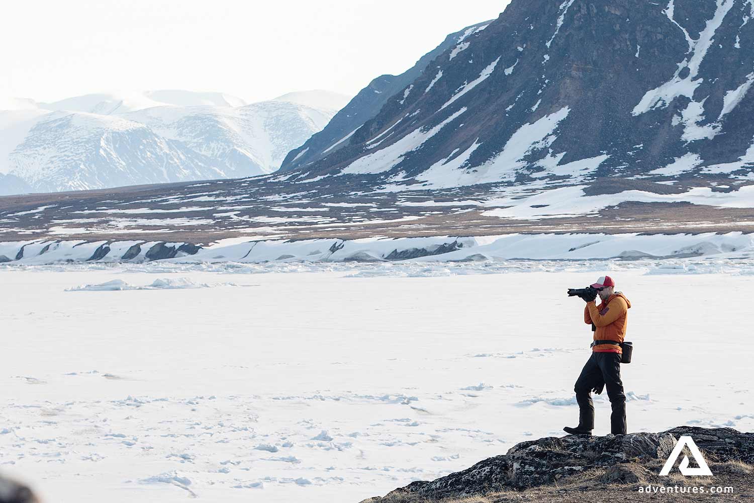 taking pictures in Sirmilk National Park in north canada