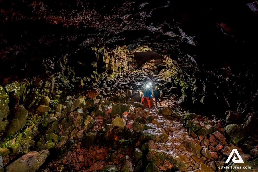 inside the dark Raufarholshellir lava cave