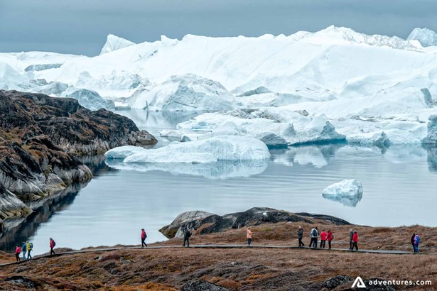 People expedition on Arctic Iceberg