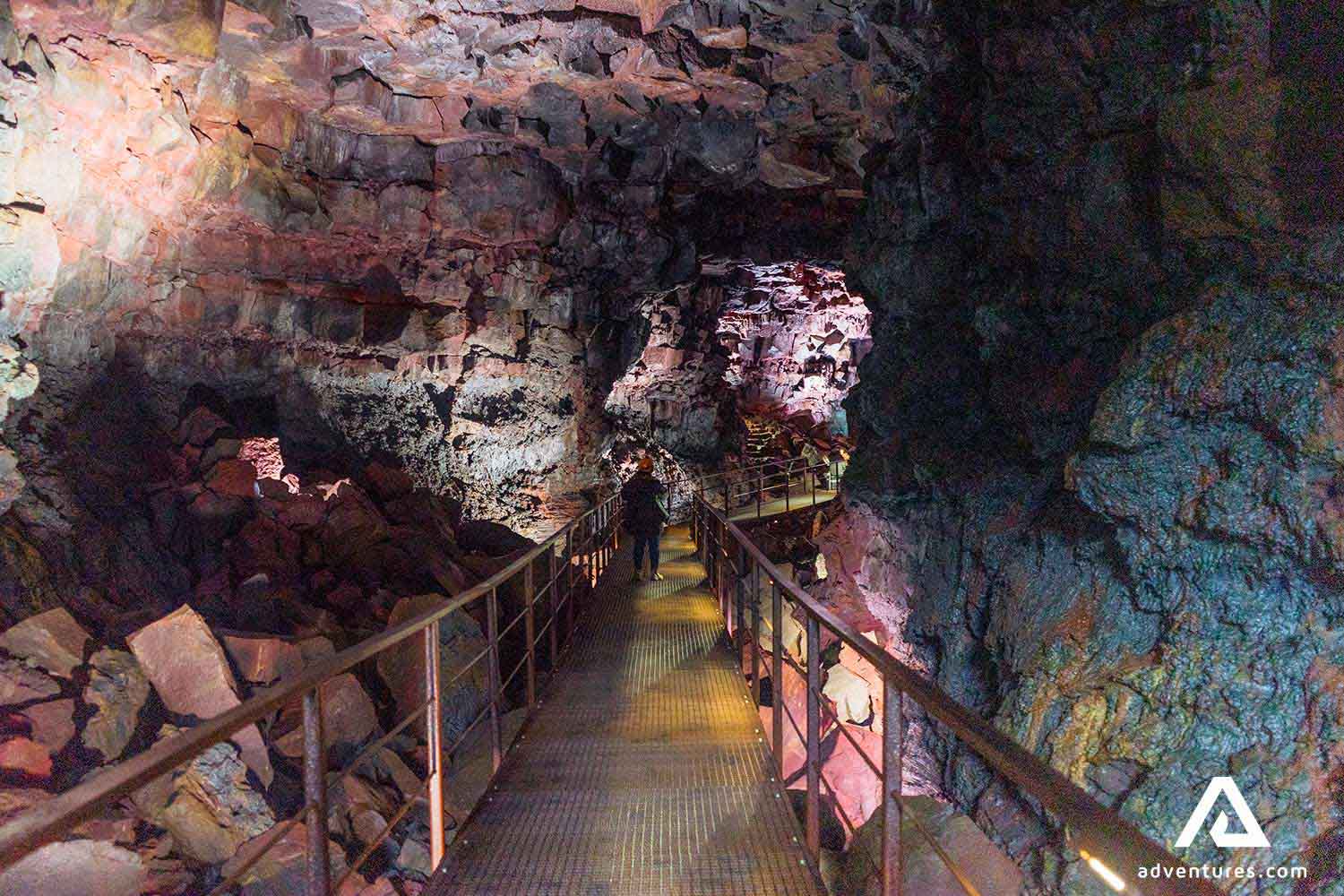 steel walking path inside a lava cave