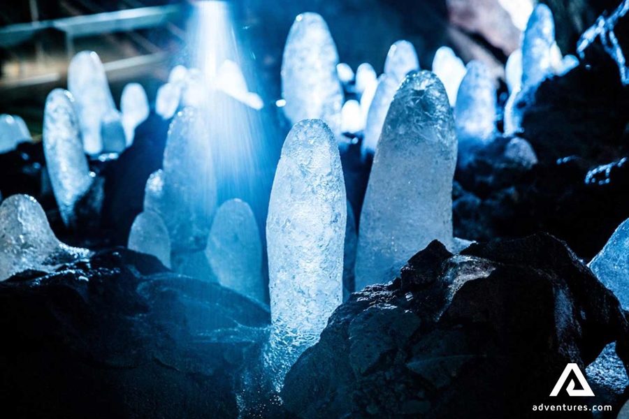 blue rock crystal formations in a lava cave