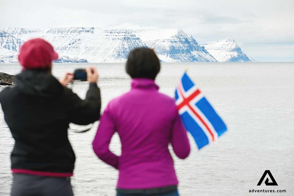 Taking Pictures Westfjords Winter Flag in Iceland