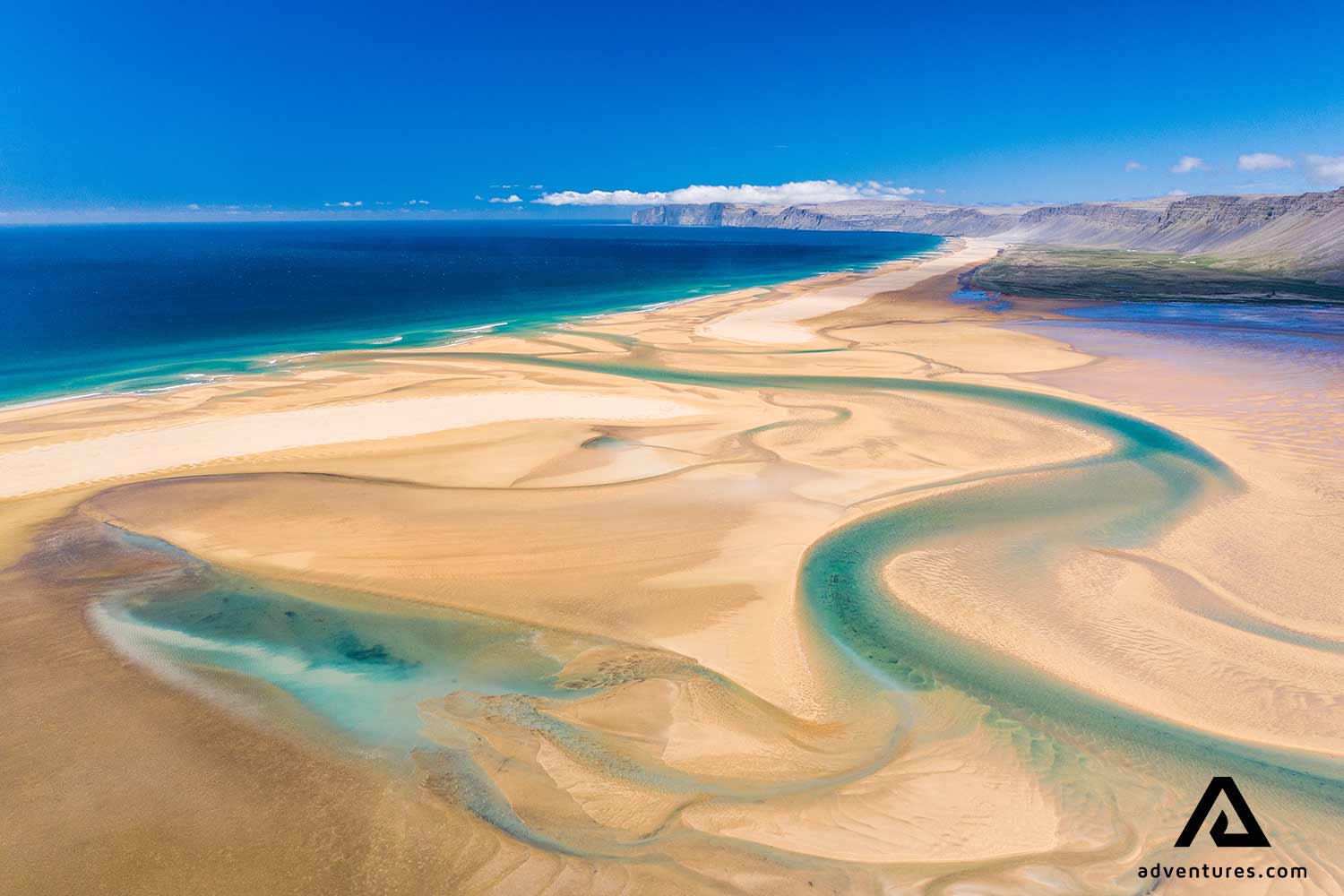 Raudasandur Beach Aerial View Blue Water Westfjords in Iceland