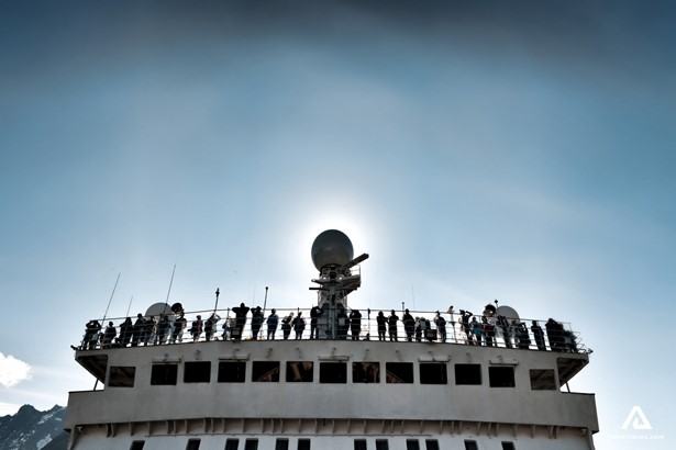 People standing in cruise ship