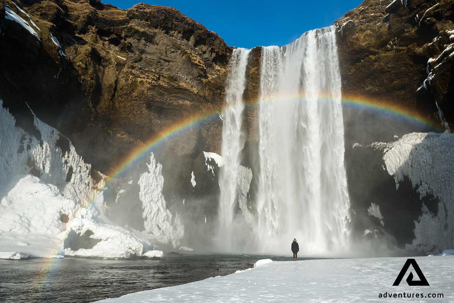 skogafoss waterfall with a rainbow
