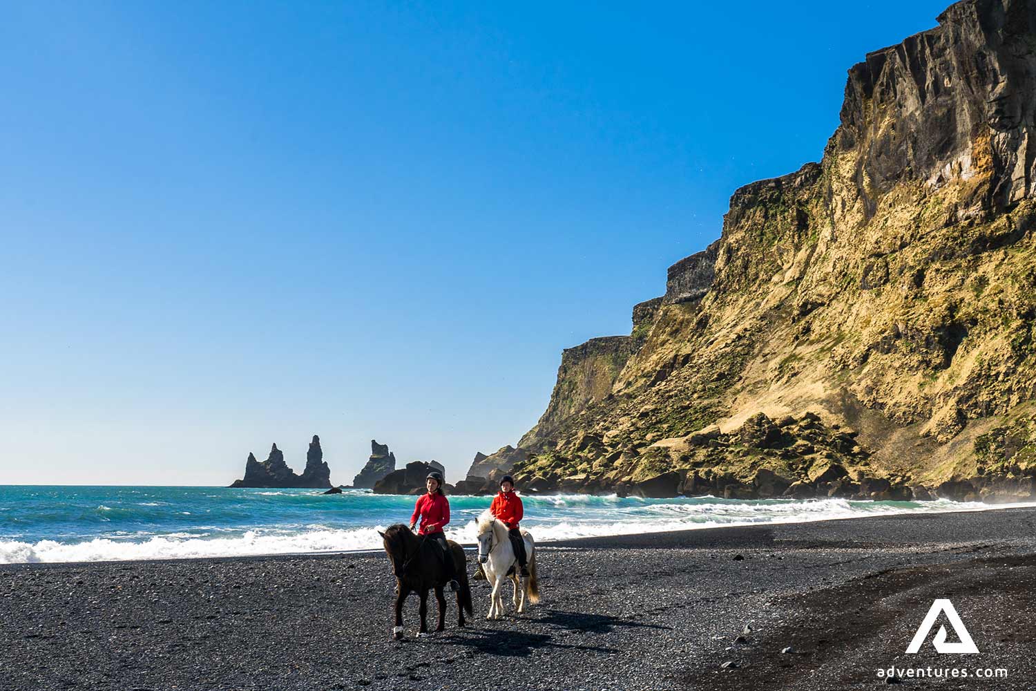 riding icelandic horses on a sunny summer day