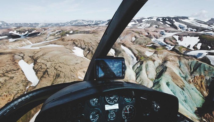 flying over landmannalaugar with a helicopter