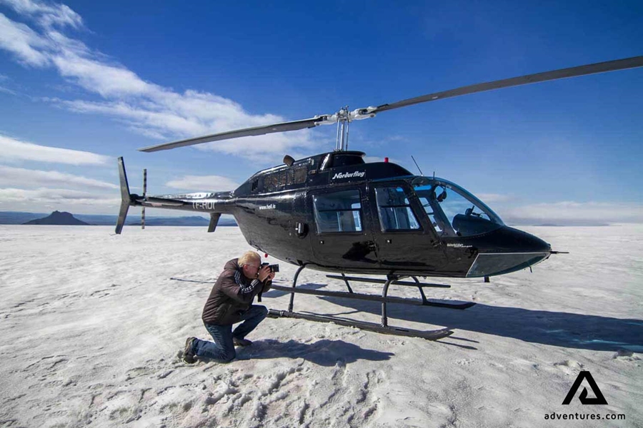 taking photos near a helicopter
