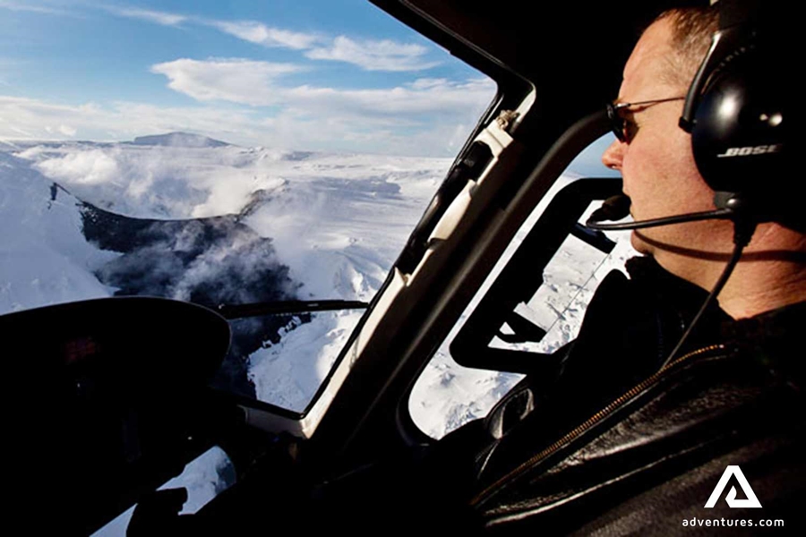 helicopter pilot looking at a geothermal area