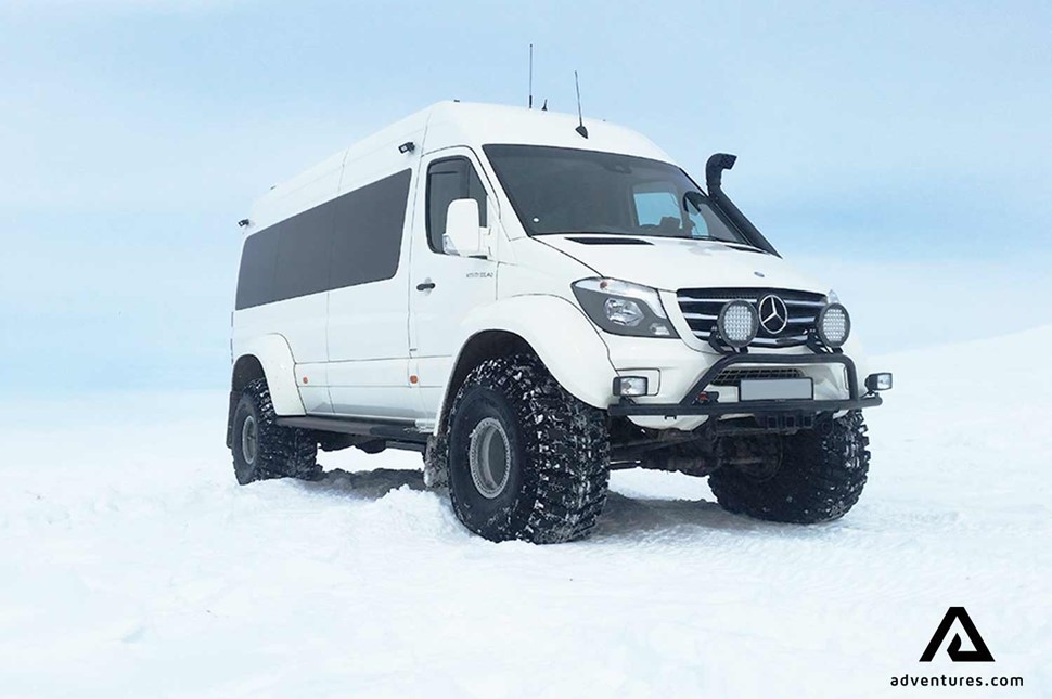 white super jeep in winter in iceland