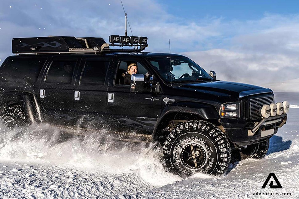 long super jeep on a snowy road in iceland