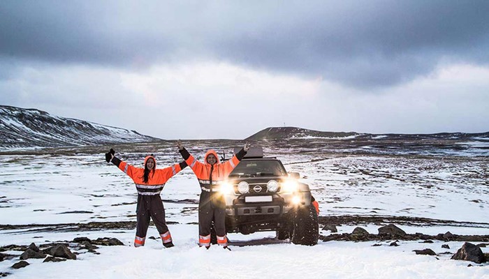 happy couple on a super jeep tour in iceland