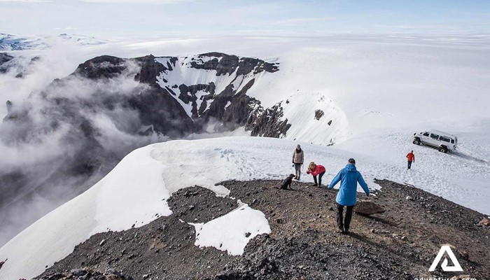 small group walking on a mountain near vatnajokull glacier