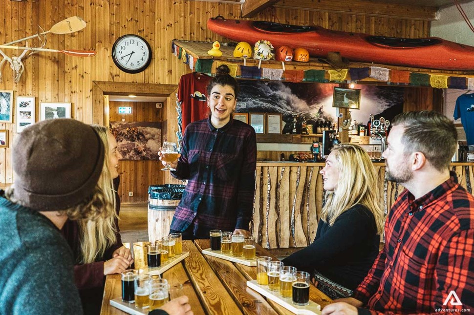 beer tasting near gullfoss waterfall after rafting tour