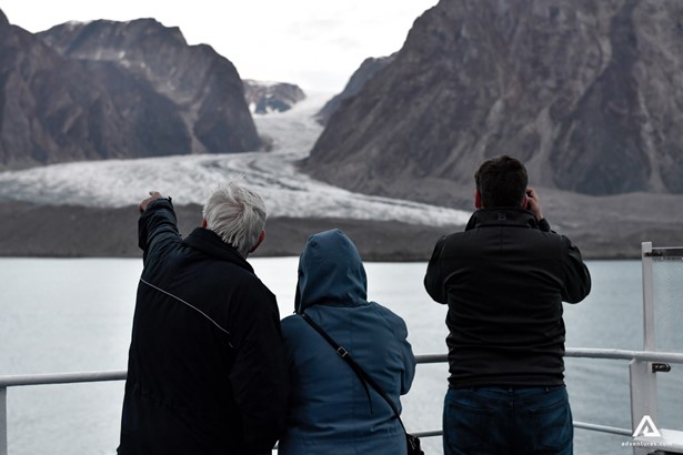 People exploring Greenland nature