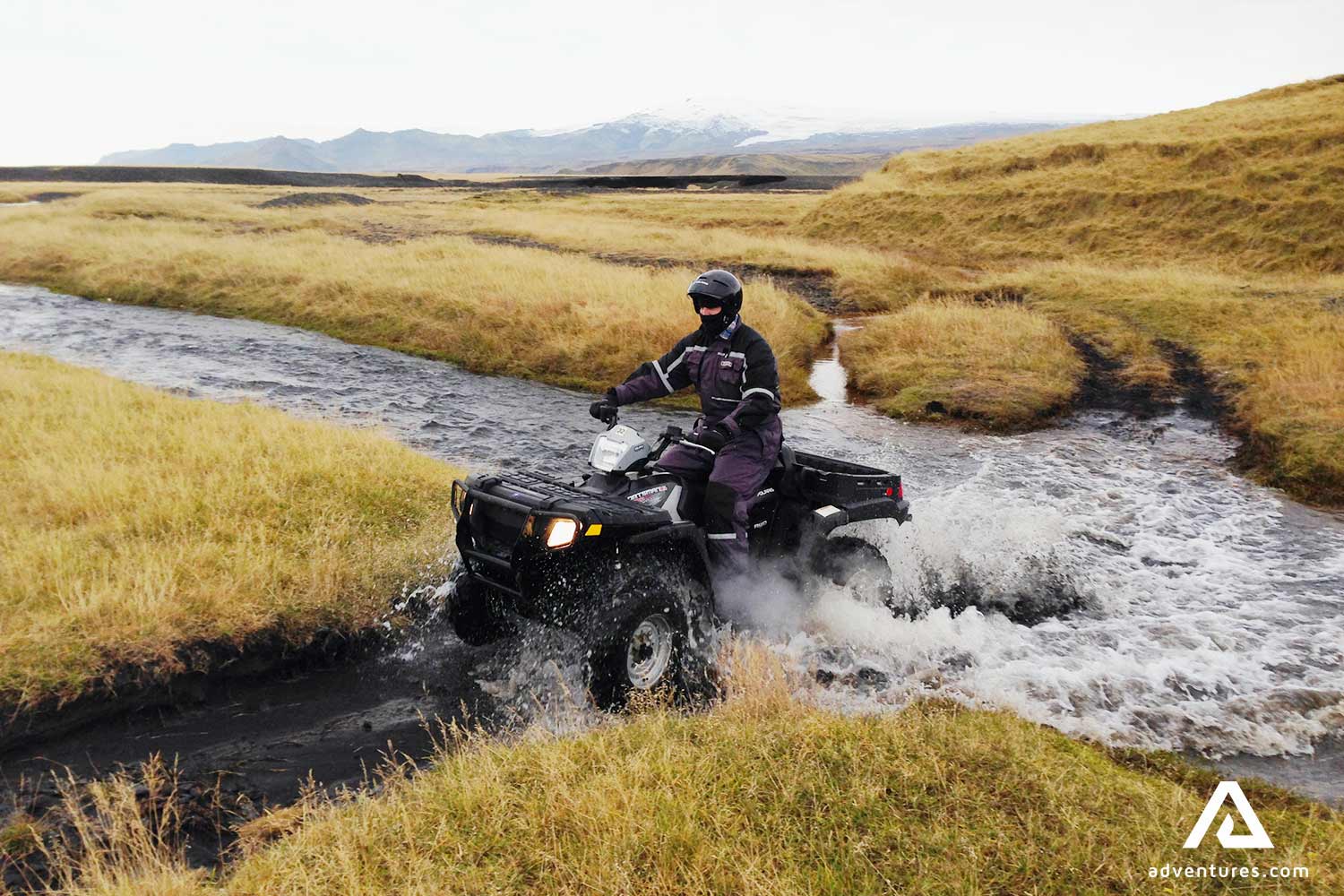 passing a small river with atv