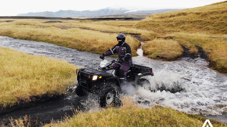 passing a small river with atv