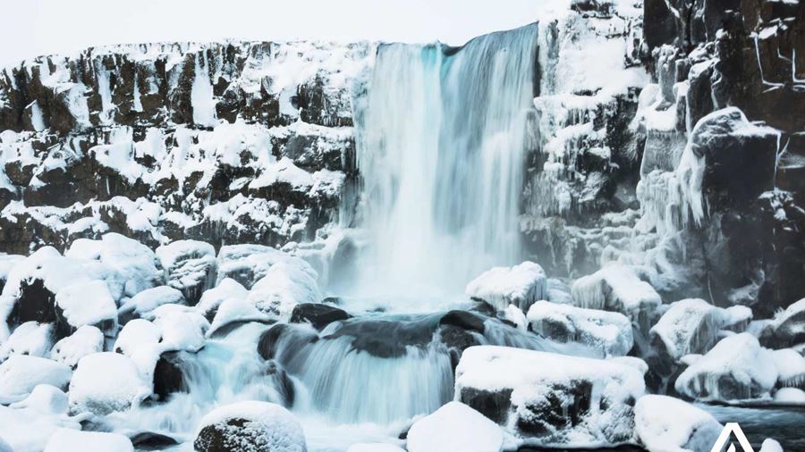 Frozen Oxararfoss waterfall