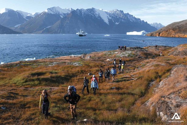 A group of tourists hiking in Greenland
