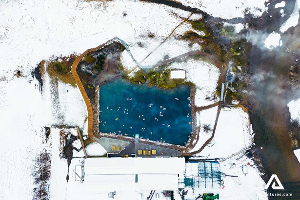 aerial view of secret lagoon in winter