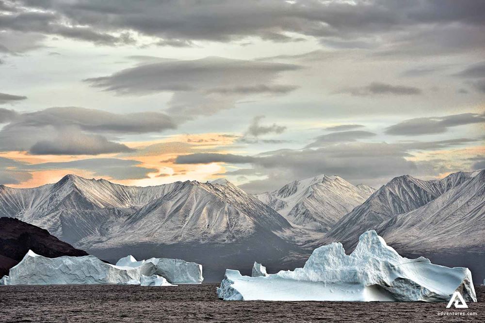The icebergs of Greenland near mountains