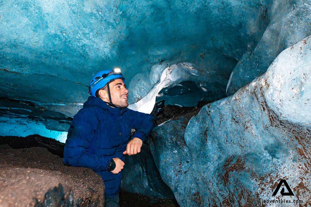 Happy man smiling inside an Ice Cave