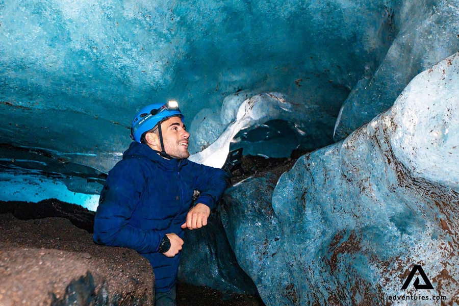 Happy man smiling inside an Ice Cave