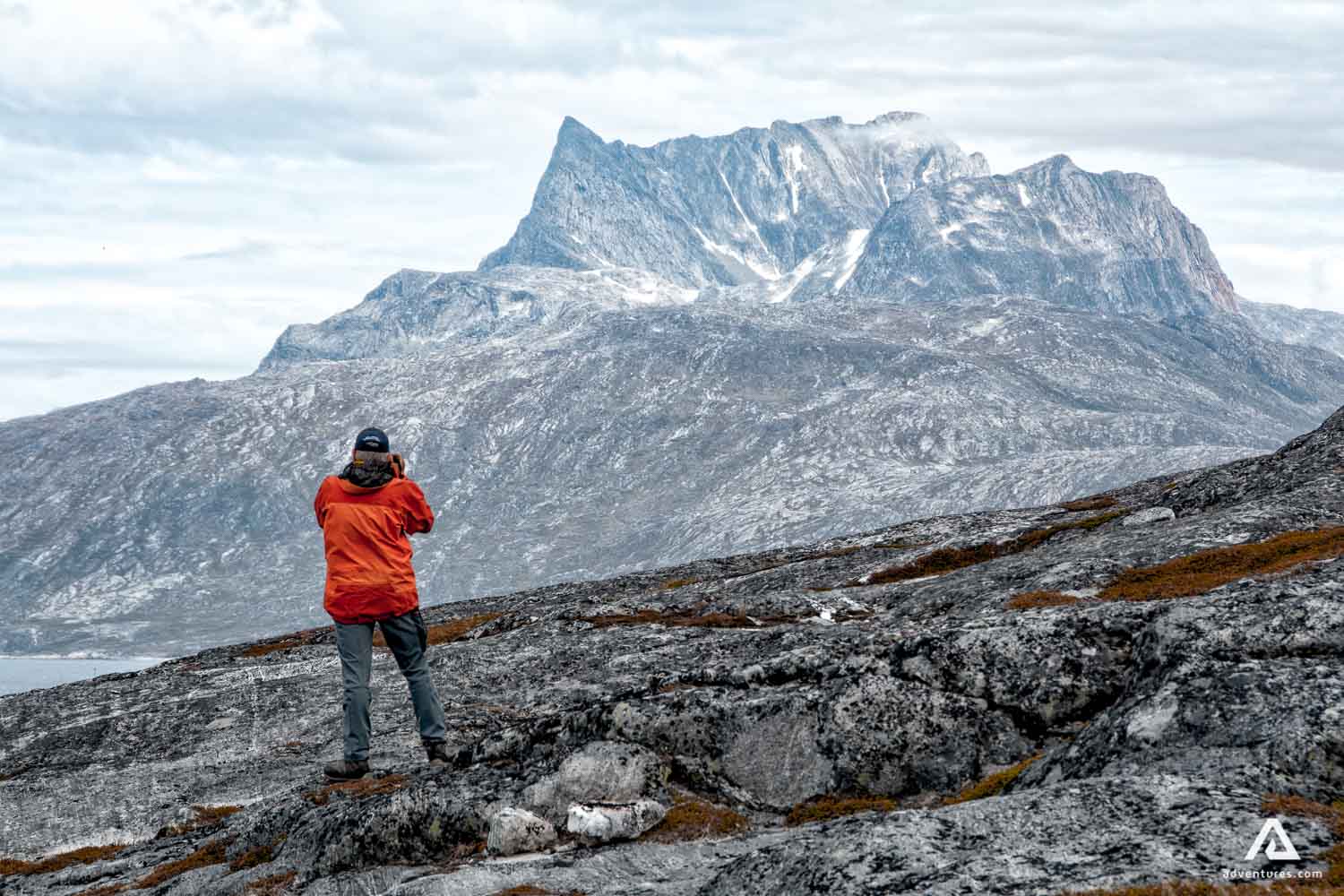 Photographer Exploring Mountain during hike