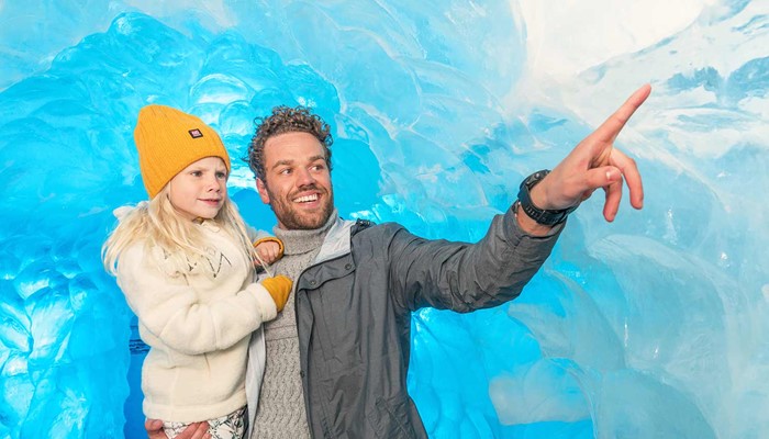 father and daughter in an artificial ice cave in perlan