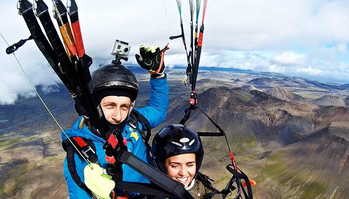 taking picture while paragliding in iceland