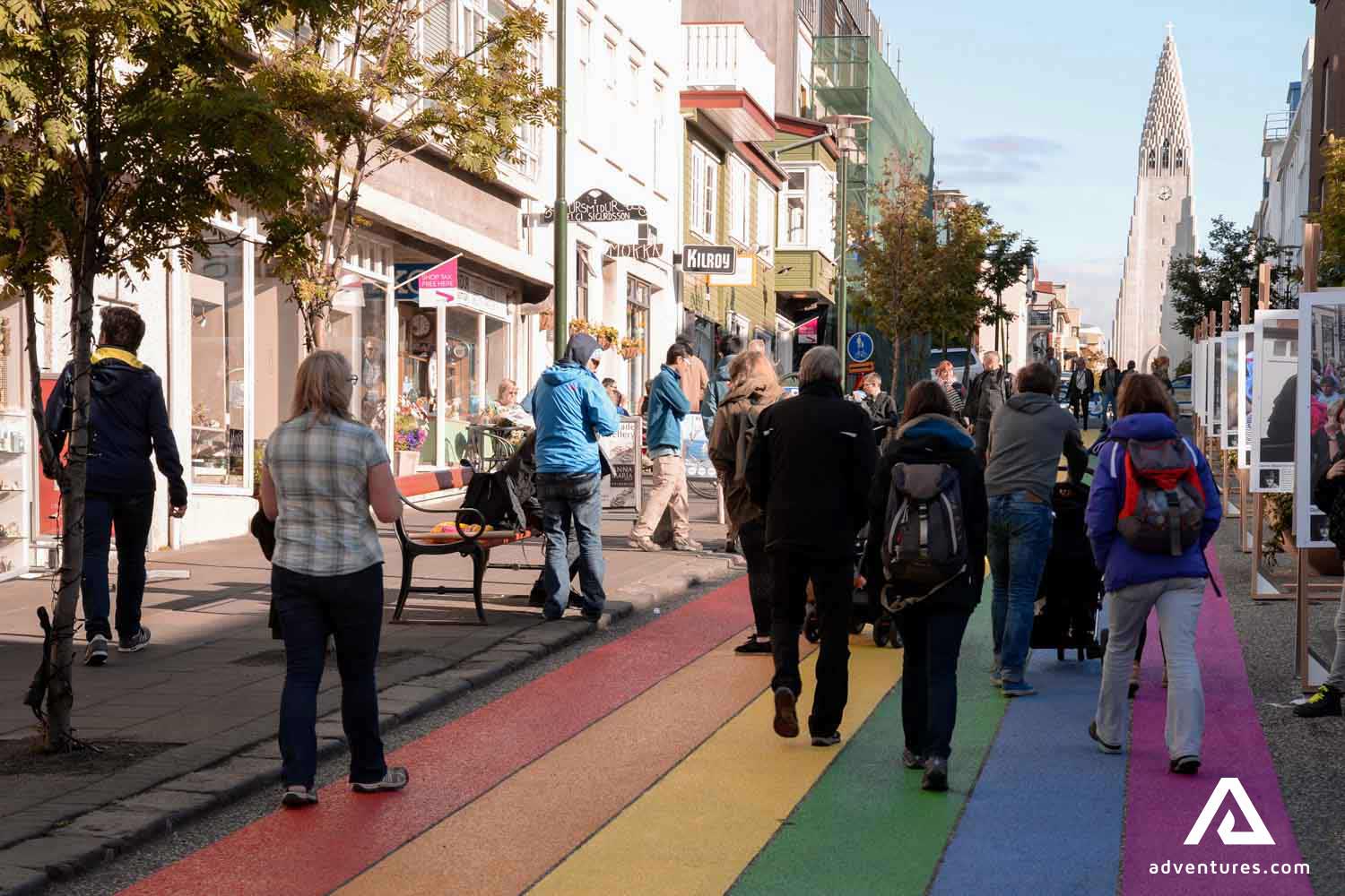 people walking down main street of reykjavik in iceland